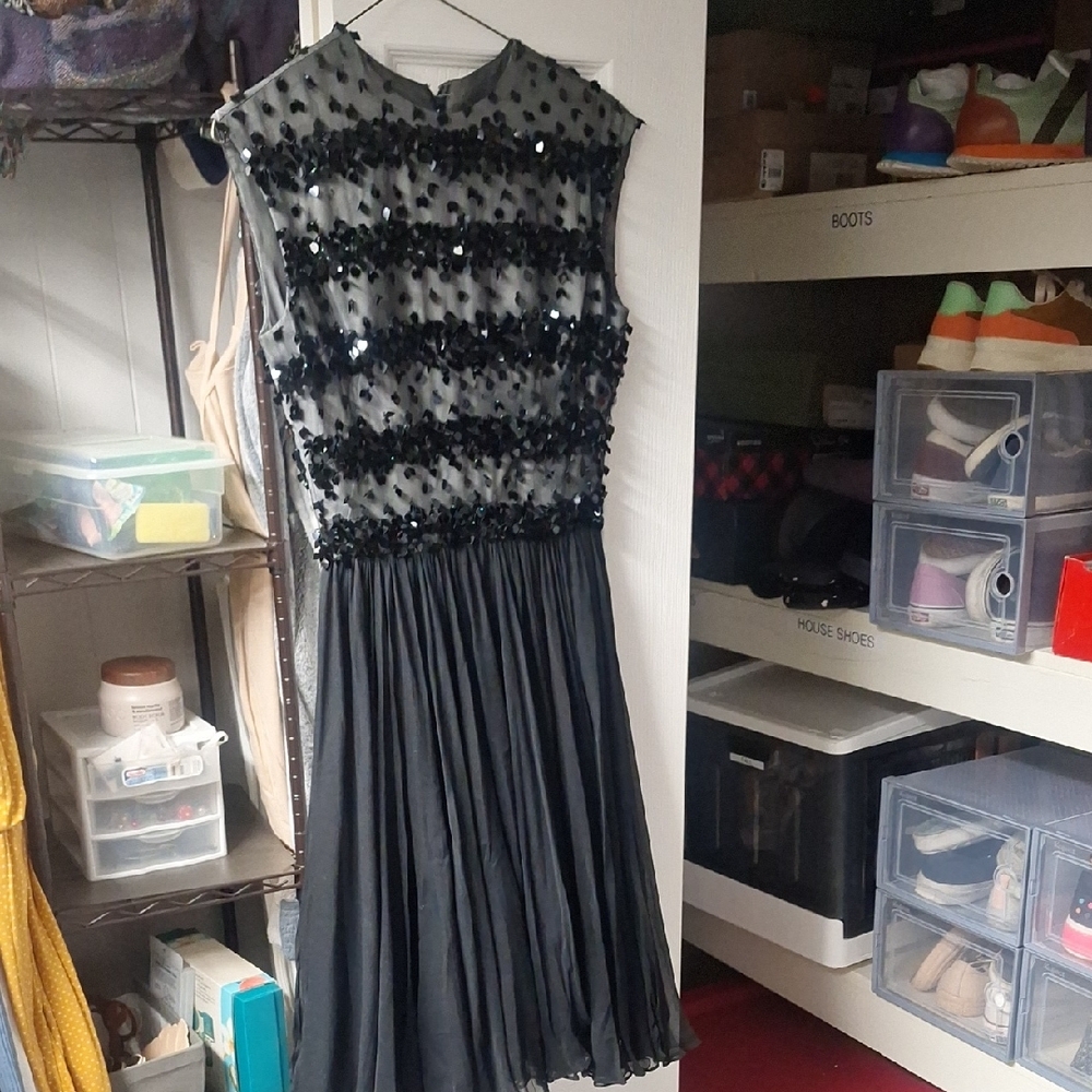 Elegant Black Sleeveless Dress with Sequin Details
